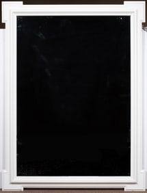 A large white painted wood mirror