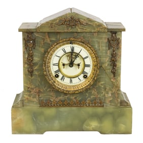 An Ansonia green onyx mantel clock