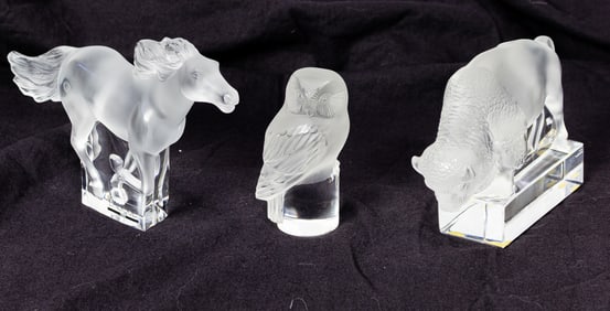 Three Lalique glass presse papiers or paper weights