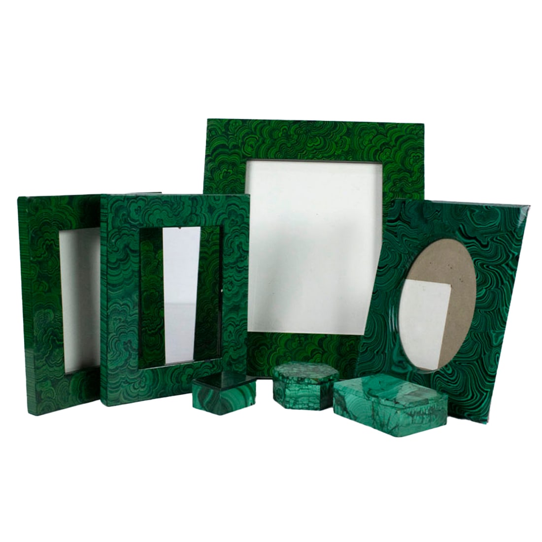 A group of malachite and faux-malachite desk articles: A group of malachite and faux-malachite desk articles, comprising (3) malachite boxes, the greatest 4" in length; (1) composite frame with oval opening, 9.5"h x 7.75"w; with (3) London Sagalyn faux-pa