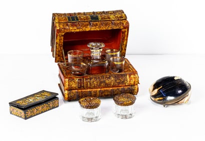 A novelty liquor set in box in the form a stack of books and small boxes