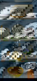 An assembled group of ceramics and decorative arts