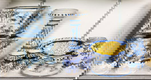 Ten pieces of Italian and Mexican blue and white ceramic table articles comprising planters and