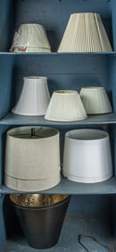 A group of twelve lamp shades