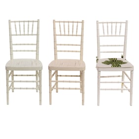 A set of three white painted Chiavari chairs