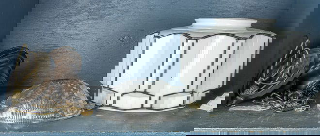 An Art Deco glass skyscraper pendant light