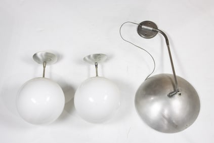 Three Kurt Versen aluminum light fixtures