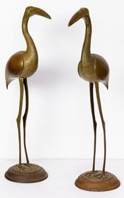 A pair of bronze ibis figures