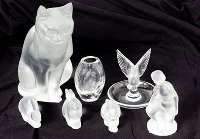 Seven Lalique glass animals and other figures with others