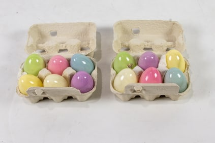 An assembled group Lladro and alabaster Easter eggs