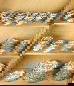 A Coalport porcelain dinner service in the India Tree pattern