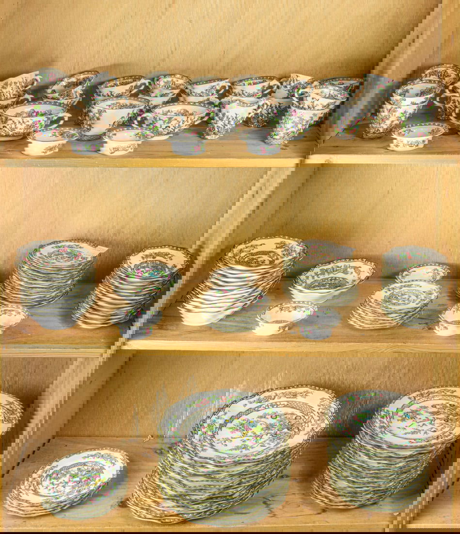 A Coalport porcelain dinner service in the India Tree pattern: A Coalport porcelain dinner service in the India Tree pattern, second quarter 20th century, each with ruffled rim, comprising (13) dinner plates, 10.5"dia; (14) plates, 9"dia; (4) plates, 7"dia; (10)