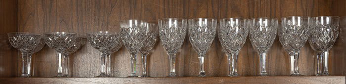 A Kosta Boda cut glass suite of stemware in the Astrid pattern