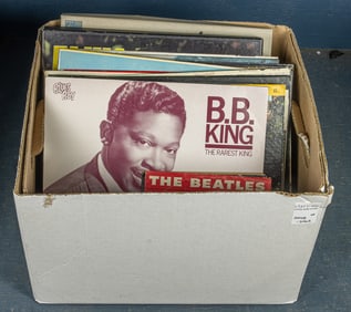 A collection of eighteen record albums
