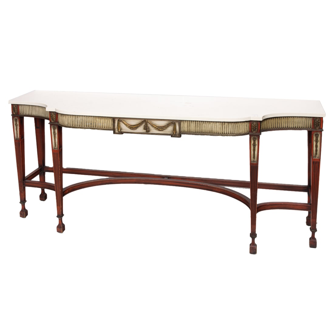 A Neoclassical style polychrome decorated mahogany console table: A Neoclassical style polychrome decorated mahogany console table, the serpentine fluted front with two drawers, raised on tapered legs, 30.25"h x 72"l x 20.25"d