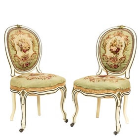 A pair of polychrome and patinated bronze mounted Louis XV-style salon chairs