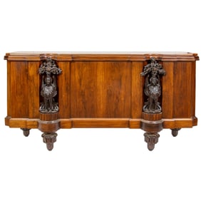 A Renaissance style partial ebonized sideboard