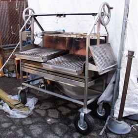 A GrillWorks stainless steel freestanding grill