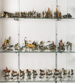 A collection of assorted German World War II painted tin toy soldiers