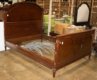 A Louis XVI style gilt bronze mounted walnut bed