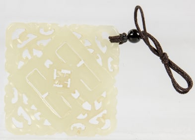 A Chinese openwork jade pendant