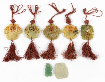 (lot of 7) Chinese carved jade and hardstone pendants