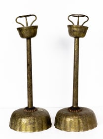 A pair of Japanese brass candle prickets