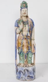 A Chinese polychrome painted wood figure of Guanyin