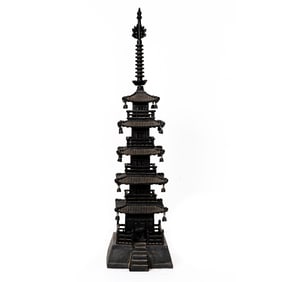 A Japanese cast iron model of a pagoda
