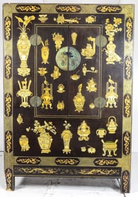 A Chinese gilt-lacquered cabinet