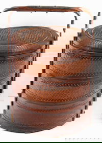 A Chinese two-tiered bamboo and rattan food basket