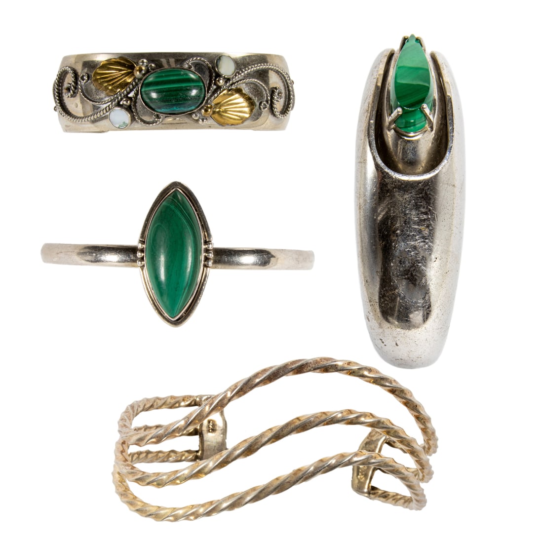 Four sterling silver and malachite cuffs: Four sterling silver and malachite cuffsComprising four sterling silver cuffs set with malachite; gross weight: 133.55 grams