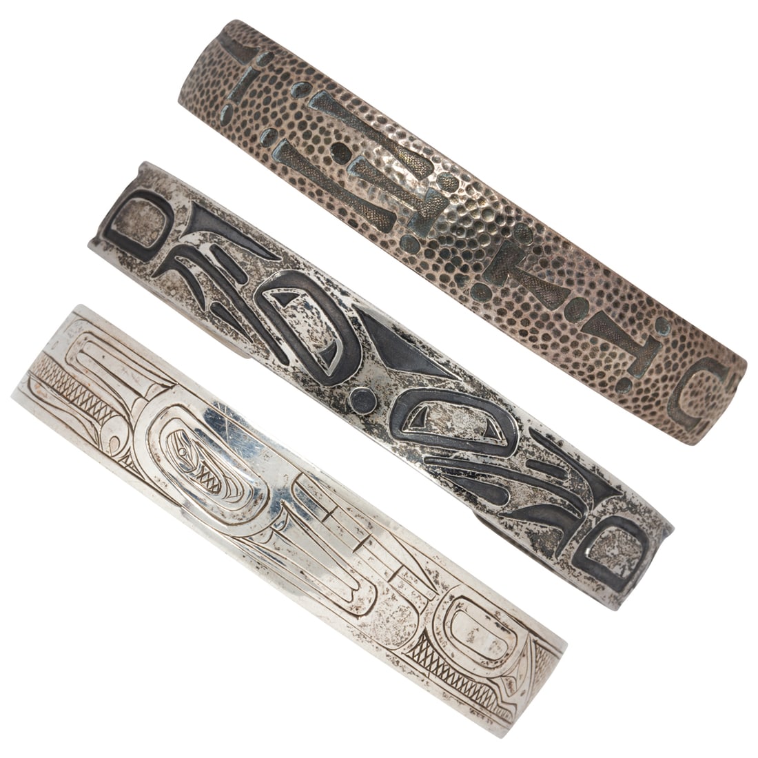 Three sterling silver cuffs: Three sterling silver cuffsComprising three sterling silver cuffs, designed with ornate etchings; gross weight: 71.80 grams