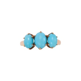 A turquoise and 14k rose gold ring