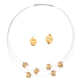 A gold filled choker necklace and earring set