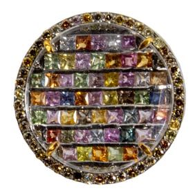 A sapphire, diamond, silver, and 14k gold ring