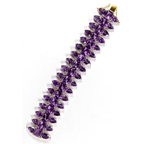 An amethyst, diamond, silver, and 14k gold bracelet