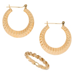 A pair of 14k gold hoop earrings and ring