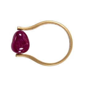 A ruby, diamond, and 18k gold ring