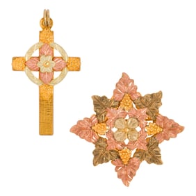 Two black hills 10k gold pendants