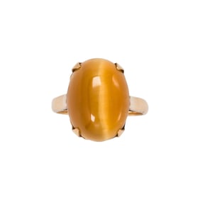 A tiger's eye and 18k gold ring