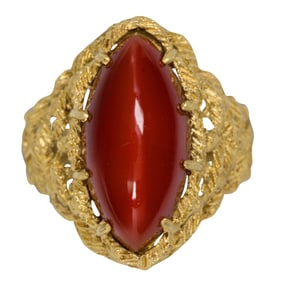 A coral and 18k gold ring