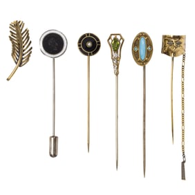 Six gold tone and hardstone pins