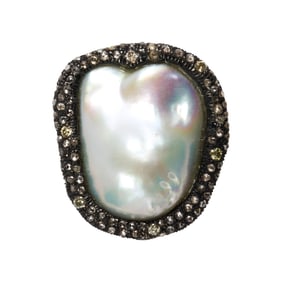 A cultured pearl, diamond and blackened silver ring