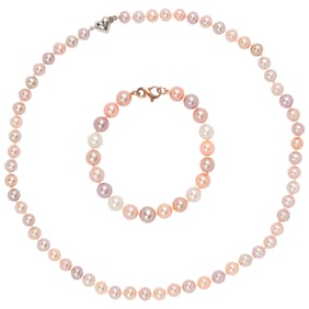A freshwater cultured pearl and silver necklace and bracelet set
