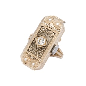 A diamond and 14k white gold watch ring