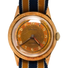 An 18k gold Tiffany & Company wrist watch