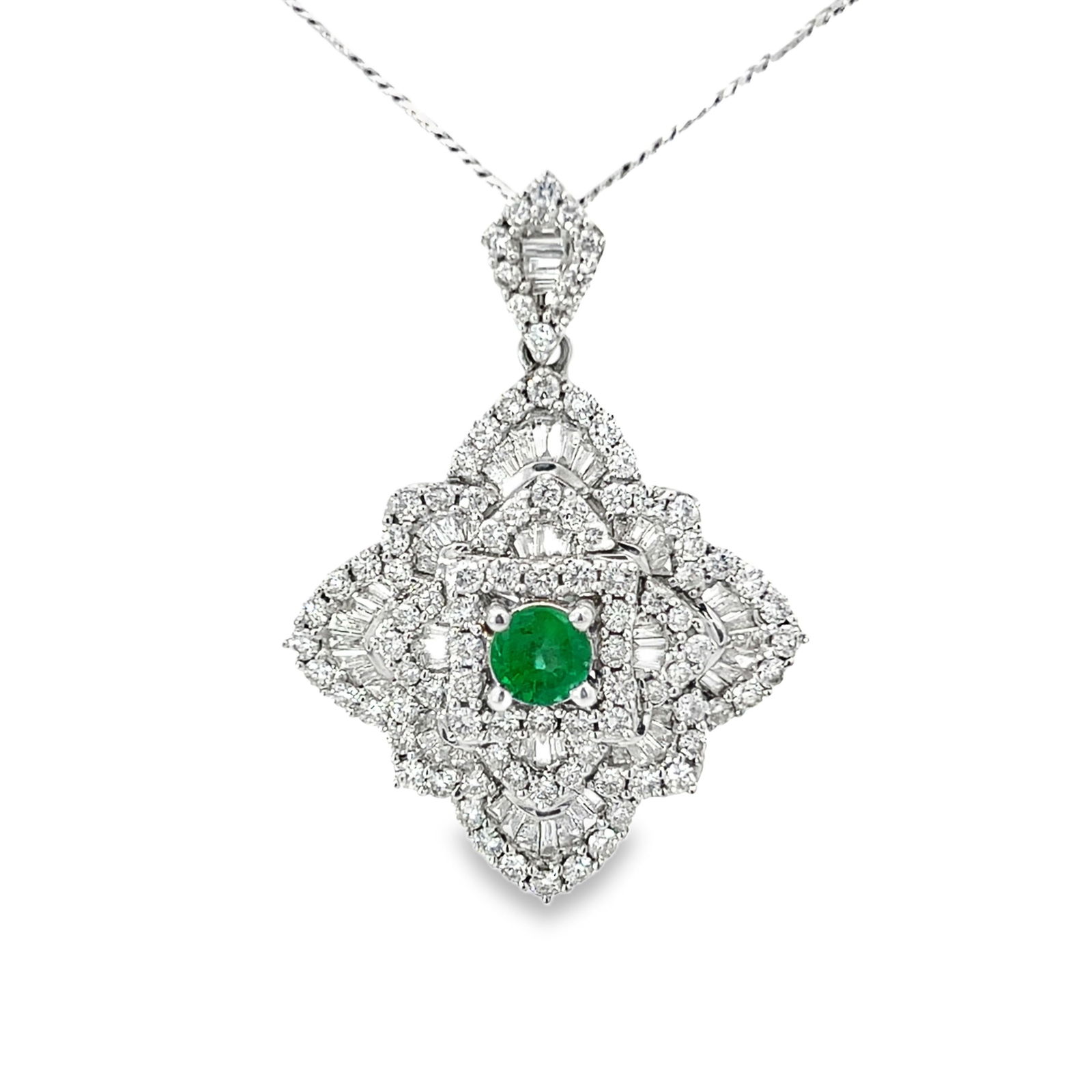 Emerald, Diamond and 18k White Gold Pendant Necklace: Emerald, diamond and 18k white gold pendant and necklace. padent: 1.18"h x 1.18"w (3 x 3 cm); necklace: 20.08"l (51 cm) NOTE: THIS ITEM IS IN LOS ANGELES.