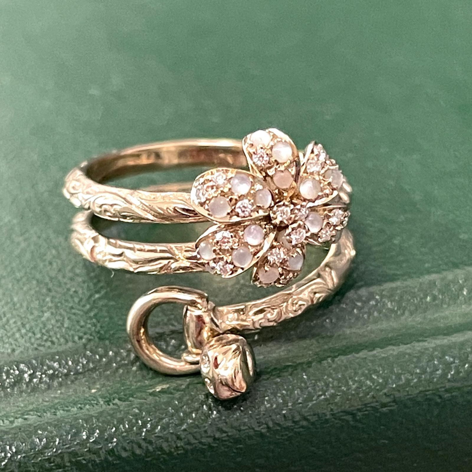 Gucci, Moonstone, Diamond and 18K Gold Ring: Cucci, moonstone, diamond and 18k gold ring. 21 diamonds weigh approximately 0.25 carats; ring size: 5.5; gross weight 7.4 grams. NOTE: THIS ITEM IS IN NEW YORK WHERE IT CAN BE SHIPPED FROM.