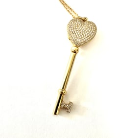 Tiffany & Co., Diamond and 18K Yellow Gold Key locket Pendant With Chain